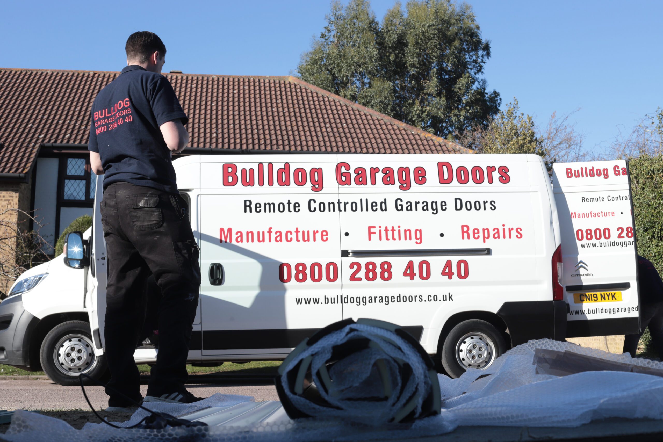 Garage Door Repairs - picture of sign written repair van for Bulldog Garage Doors